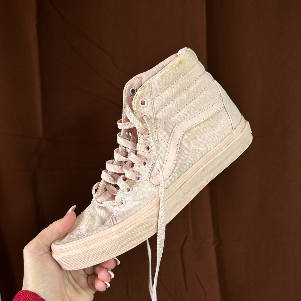 Baby pink high-top vans